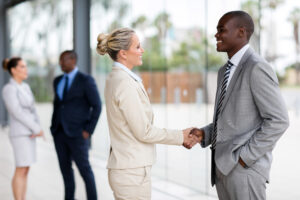 business people handshaking in office