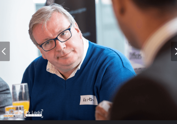 Middle aged man rolling his eyes